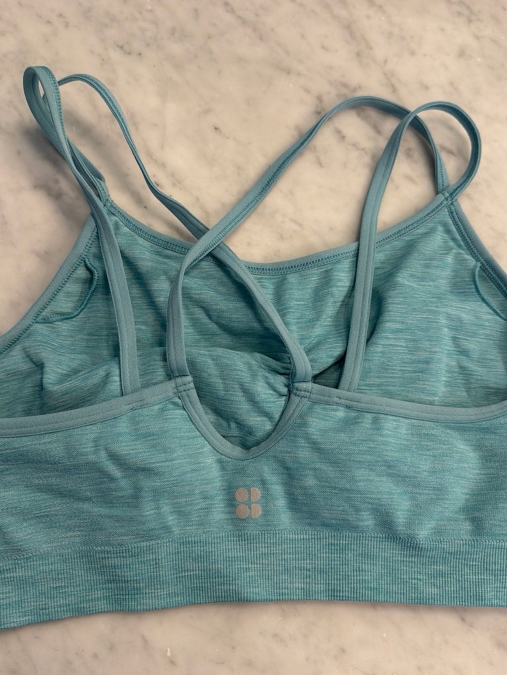 Sweaty Betty light teal strappy sports bra